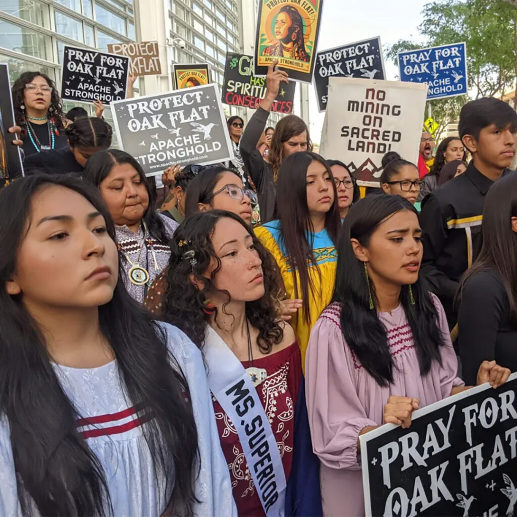 Chanting prayers and holding signs, Apache protestors hoped to halt a massive copper mining project on federal land in Arizona that they hold sacred.
