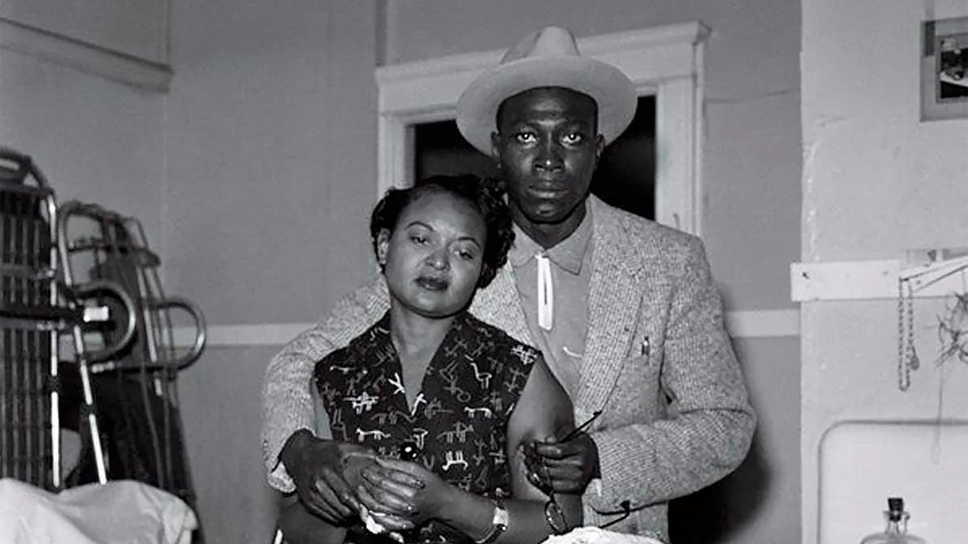 Mamie Till is held by her future husband, Gene Mobley, as she views the body of her son, Emmett Till, aged 14.